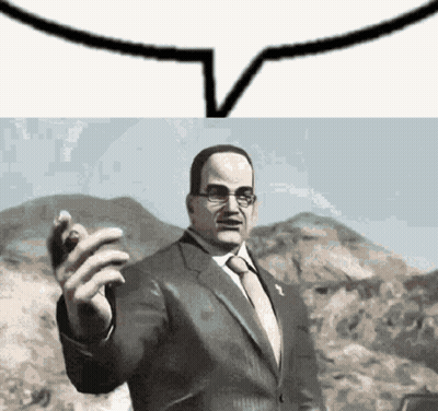 Man In Suit Standing Before Mountain With Speech Bubble GIF