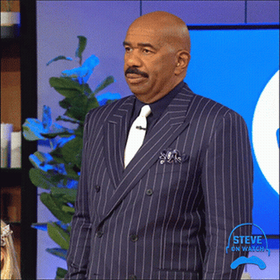 Man In Suit Standing Before Steve On Waves GIF