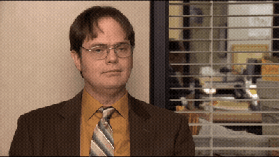 Man In Suit Standing By Window GIF