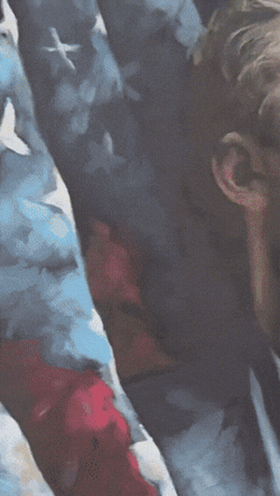 Man In Suit Standing In Front Of American Flag GIF
