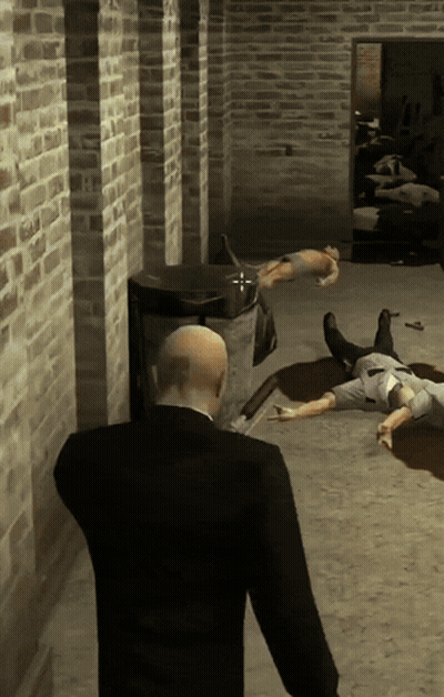 Man In Suit Standing In Front Of Brick Wall With Dead People GIF