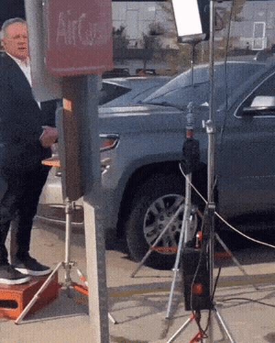 Man In Suit Standing In Front Of Car Saying Who GIF