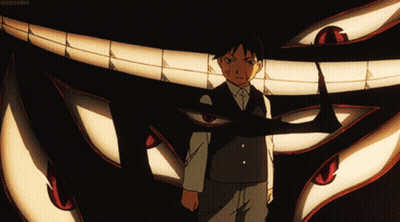 Man In Suit Standing In Front Of Monster Mouth GIF