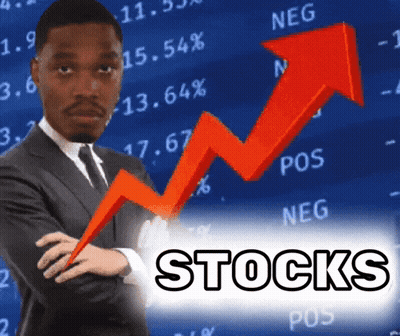 Man In Suit Standing In Front Of Stock Graph GIF
