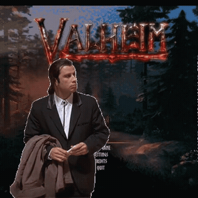 Man In Suit Standing In Front Of Video Game GIF