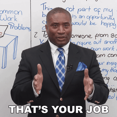 Man In Suit Standing In Front Of Whiteboard Saying That's Your Job GIF