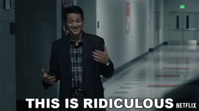 Man In Suit Standing In Hallway This Is Ridiculous Netflix GIF