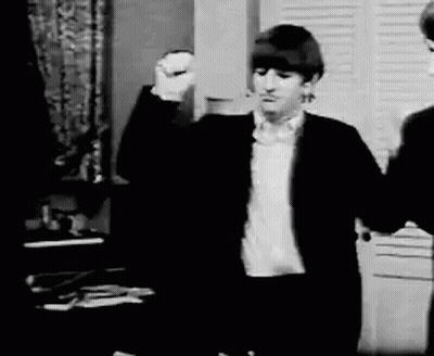 Man In Suit Standing Next To Another Man GIF