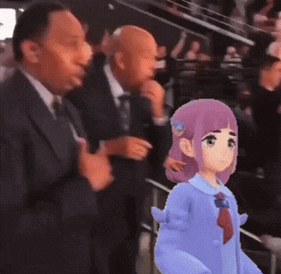 Man In Suit Standing Next To Girl In Blue Shirt GIF