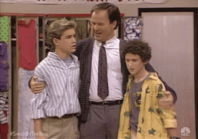 Man In Suit Standing Next To Two Boys In Locker Room GIF