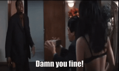 Man In Suit Standing Next To Woman In Bra Saying Damn You Fine GIF