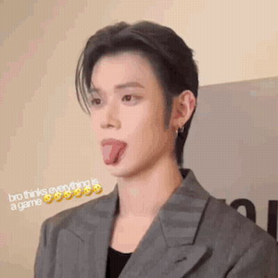 Man In Suit Sticking Tongue Out GIF
