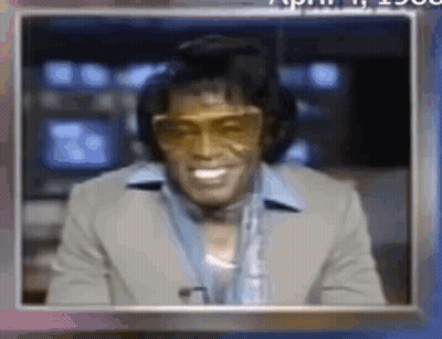 Man In Suit Sunglasses Smiling With Headphones Microphone GIF
