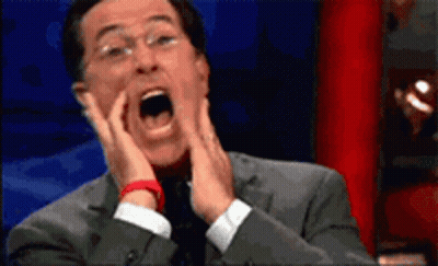 Man In Suit Surprised Hands On Face GIF