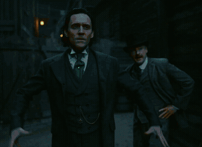 Man In Suit Surrounded By Green Glowing Flames GIF