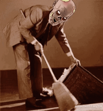 Man In Suit Sweeping With Zombie Mask GIF