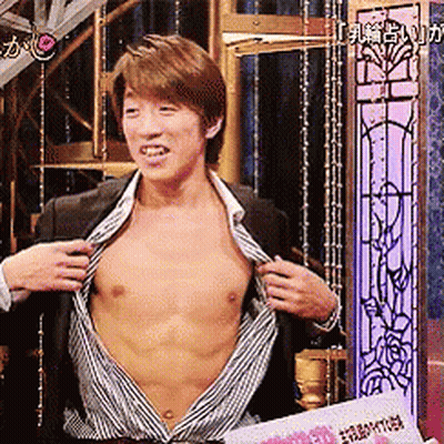 Man In Suit Taking Off Shirt GIF