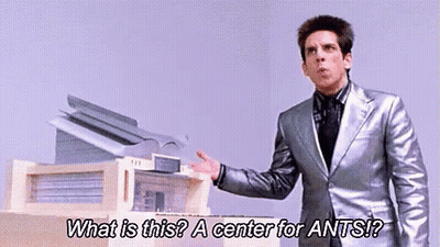 Man In Suit Talking About Ants In Front Of Printer GIF