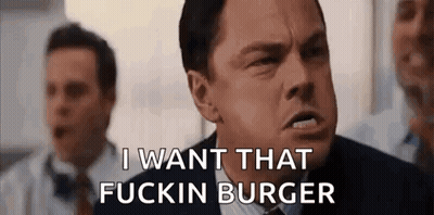 Man In Suit Talking About Burger GIF