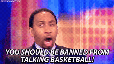 Man In Suit Talking Basketball GIF