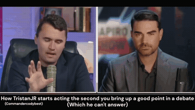 Man In Suit Talking Into Microphone With Onlooker GIF