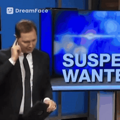 Man In Suit Talking On Cell Phone GIF