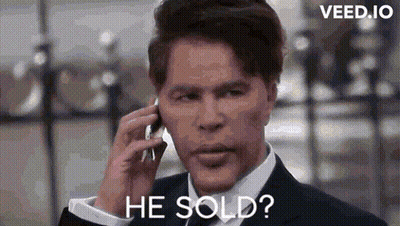 Man In Suit Talking On Cell Phone Asking If He Sold GIF
