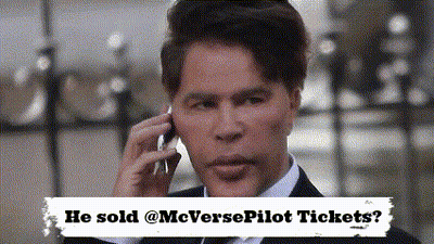 Man in Suit Talking on Cell Phone He Sold @mcverse Pilot Tickets