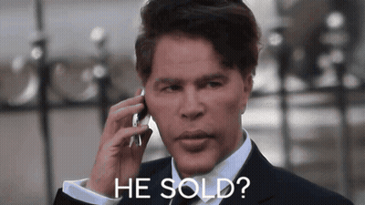 Man In Suit Talking On Cell Phone Saying He Sold GIF