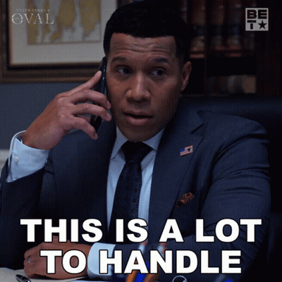 Man In Suit Talking On Cell Phone Saying This Is A Lot To Handle GIF