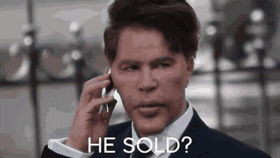 Man In Suit Talking On Cell Phone Says He Sold GIF