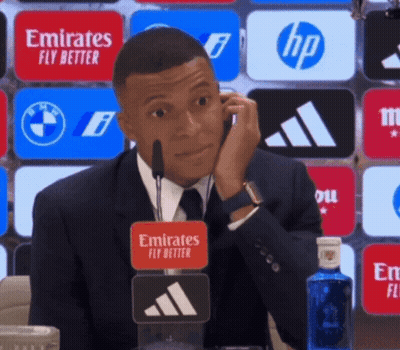 Man In Suit Talking On Cell Phone With Emirates Fly Better Sticker GIF