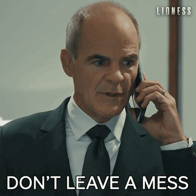 Man In Suit Talking On Phone Don't Leave A Mess GIF