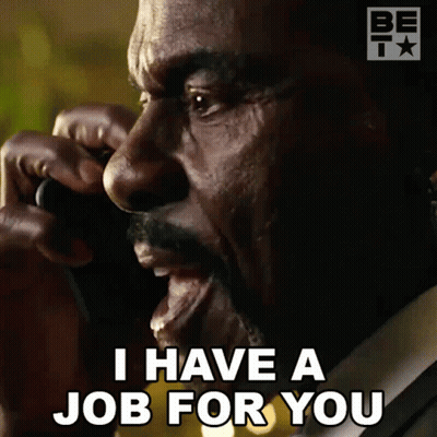 Man In Suit Talking On Phone Saying I Have A Job For You GIF