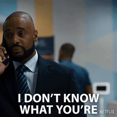 Man In Suit Talking On Phone GIF