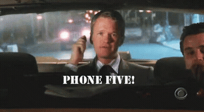 Man In Suit Talking On Phone While Driving GIF
