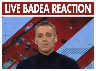 Man In Suit Talking On Phone With Another Man GIF