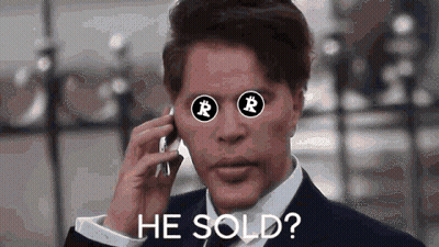 Man In Suit Talking On Phone With Bitcoin Eyes GIF
