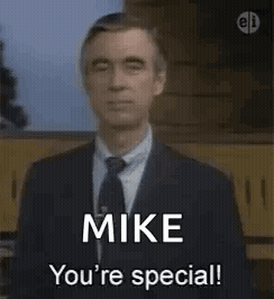 Man In Suit Talking To Another GIF