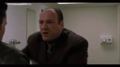Man In Suit Talking To Another Man GIF