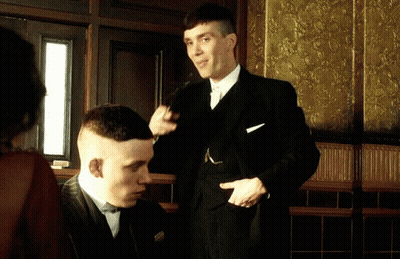 Man In Suit Talking To Another Man GIF