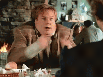 Man In Suit Talking To Another Man At Restaurant GIF