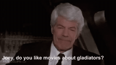Man In Suit Talking To Another Man GIF