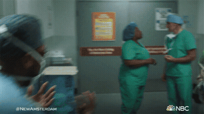 Man In Suit Talking To Another Man In Kitchen With NBC GIF