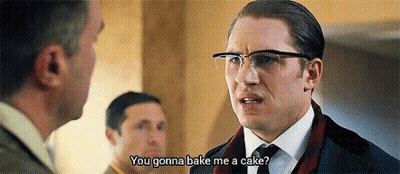 Man In Suit Talking To Another Man GIF