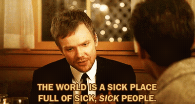 Man In Suit Talking To Another Man Saying The World Is A Sick Place Full Of Sick People GIF