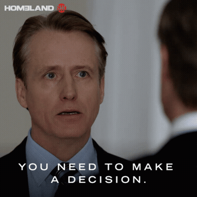 Man In Suit Talking To Another Man Saying You Need To Make A Decision GIF