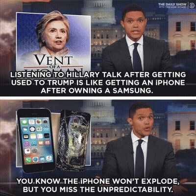 Man In Suit Talking To Hillary Clinton GIF