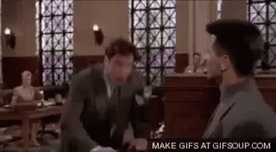 Man In Suit Talking To Man GIF