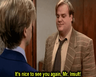 Man In Suit Talking To Man In Blue Shirt GIF